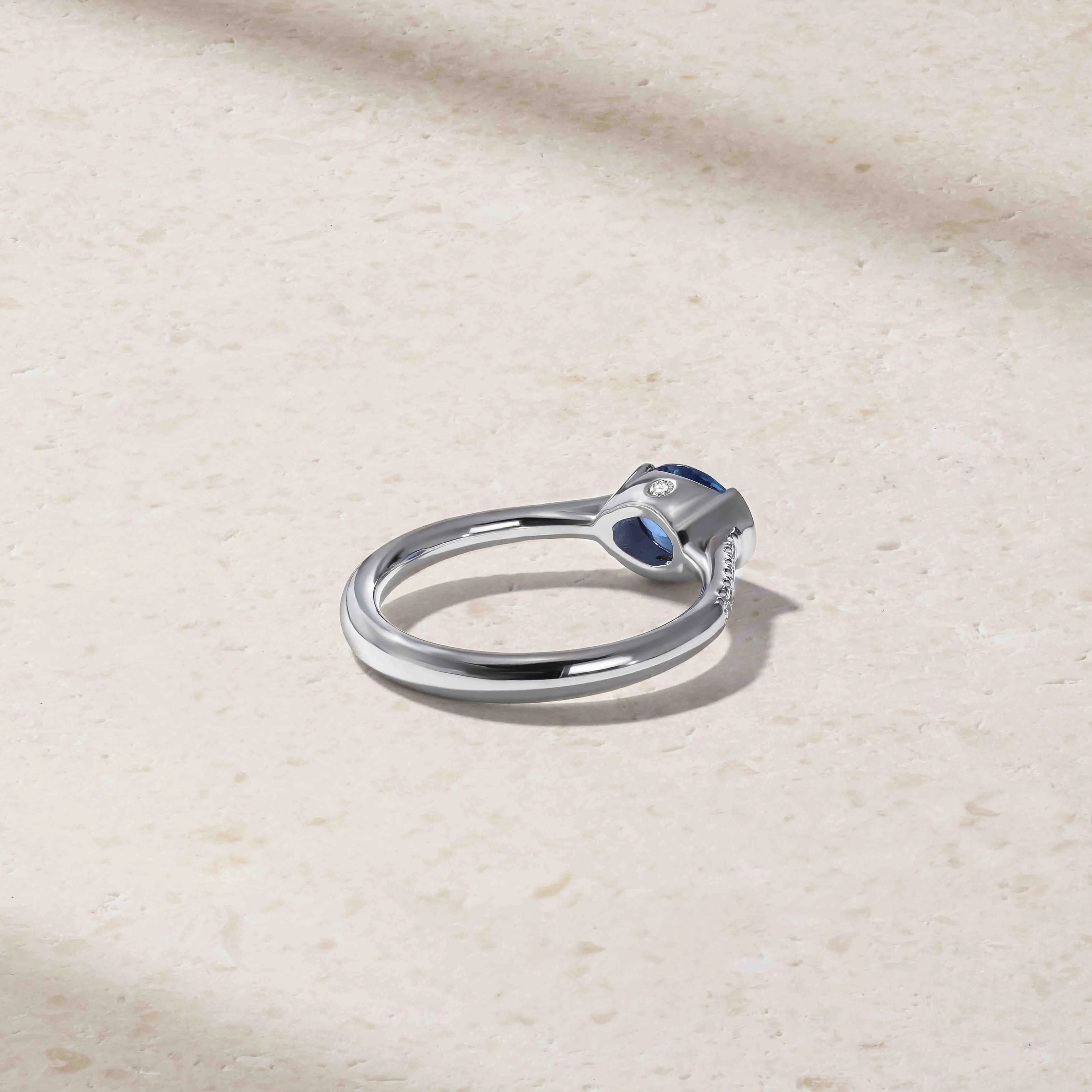 East-West Sapphire and Diamond Half Bezel Ring