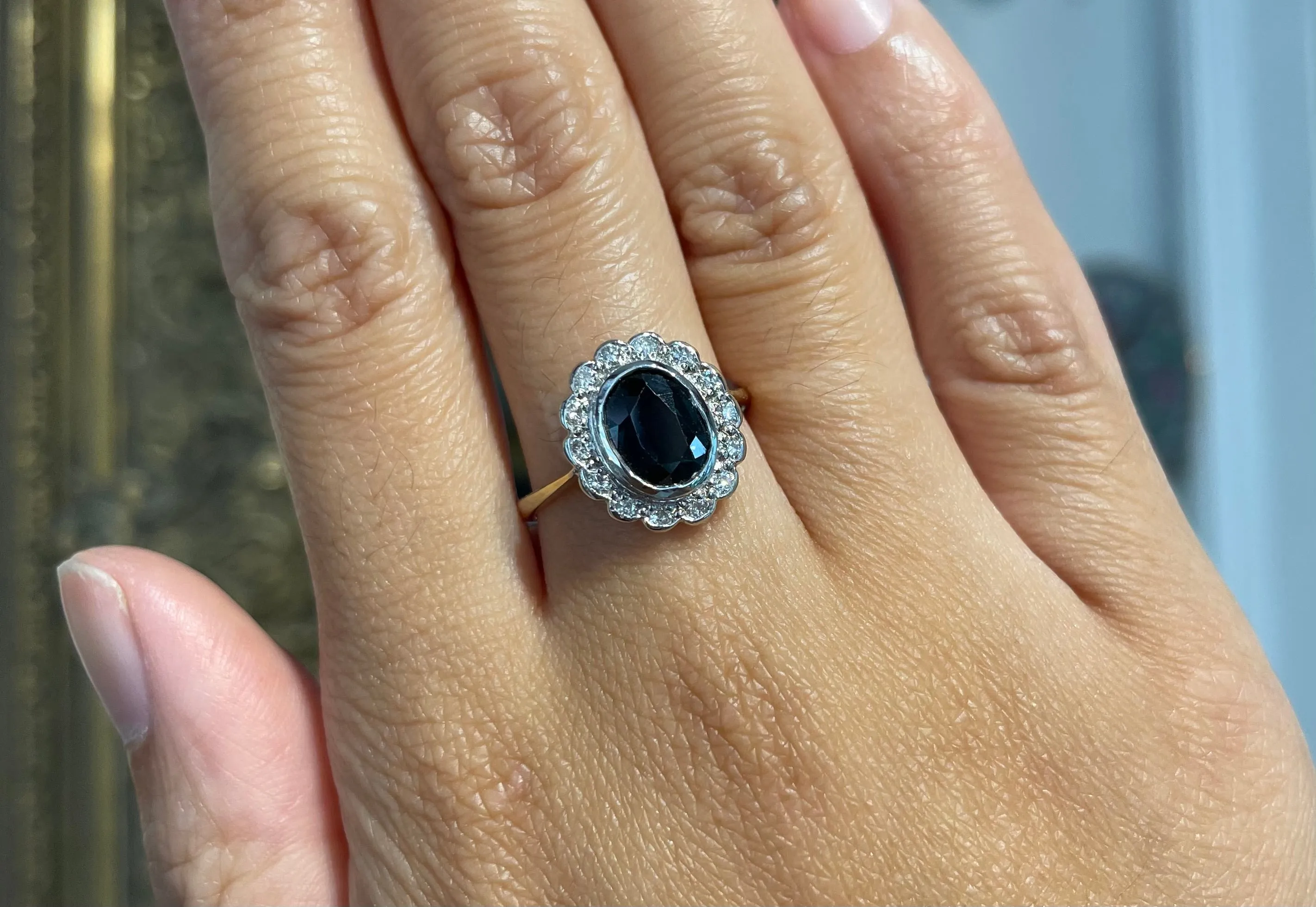 Vintage green sapphire and diamond cluster ring